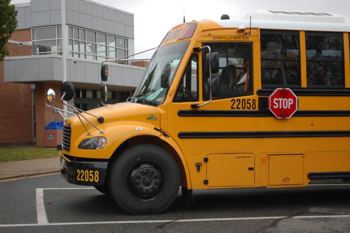 Electric school bus parked.