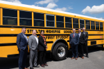 Steelton-Highspire leadership with First Student in front of one of Steelton-Highspire's electric school buses.