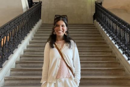 Girl stands on steps