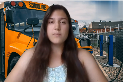 Girl talking in front of school bus green screen