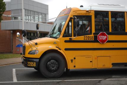 Electric school bus parked.