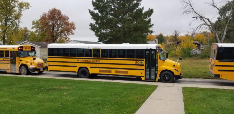 Williamsfield’s electric school buses on the road.