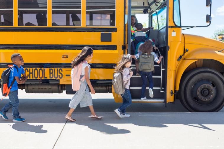Students boarding school bus