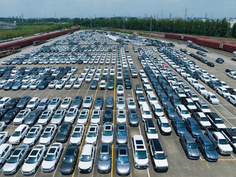 Cars parked in a parking lot.